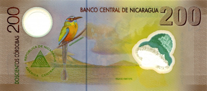 Внешний вид 200 (двухсот) никарагуанских кордоб с изображением птицы бурый момот (гуардабарранко) и вулкана на островах Ом (реверс)